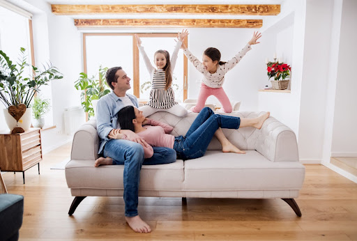 Family relaxing in the living room of their Erlanger, KY, home.
