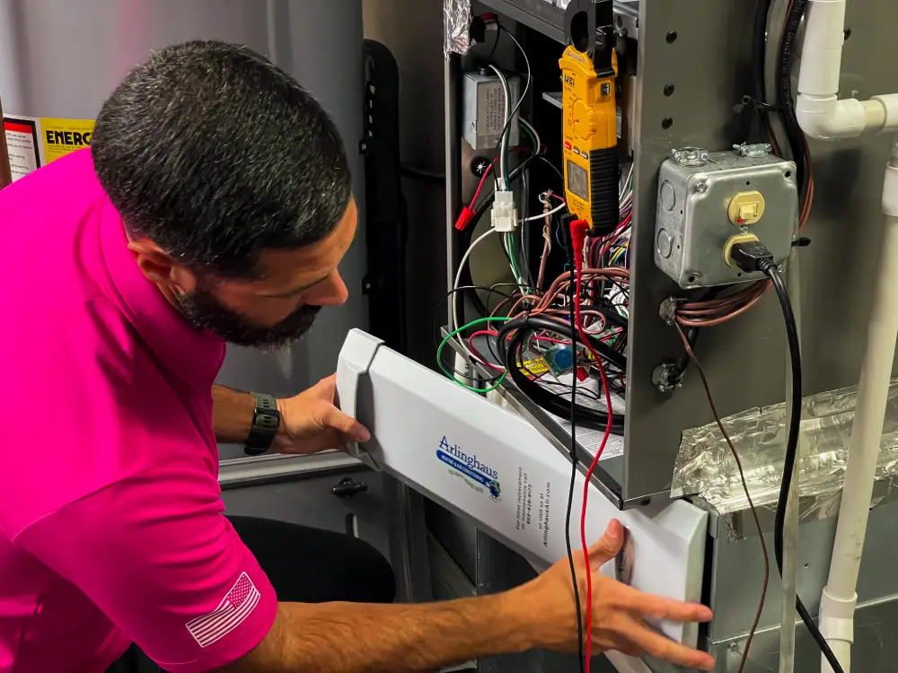 Arlinghaus technician working on a site